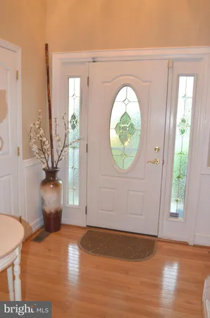 a view of a room that has a bench in it