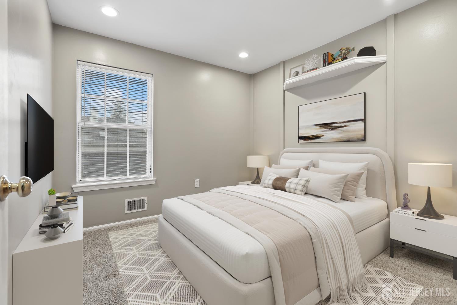 1707 Ridgeview Court Sayreville, NJ 08859 - Photo 14 of 24 a bedroom with a bed and a flat screen tv