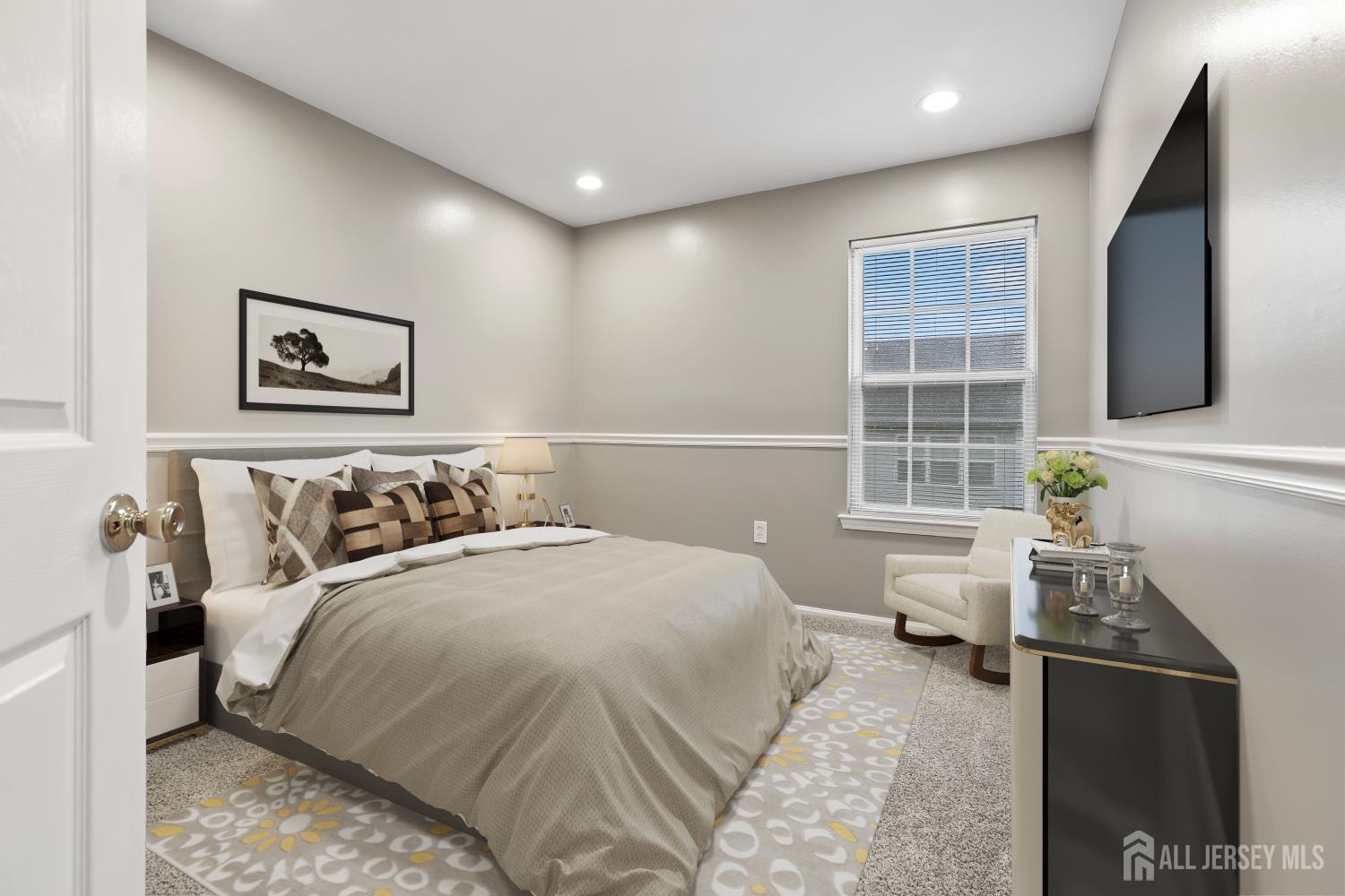 1707 Ridgeview Court Sayreville, NJ 08859 - Photo 16 of 24 a bedroom with a bed and wooden floor