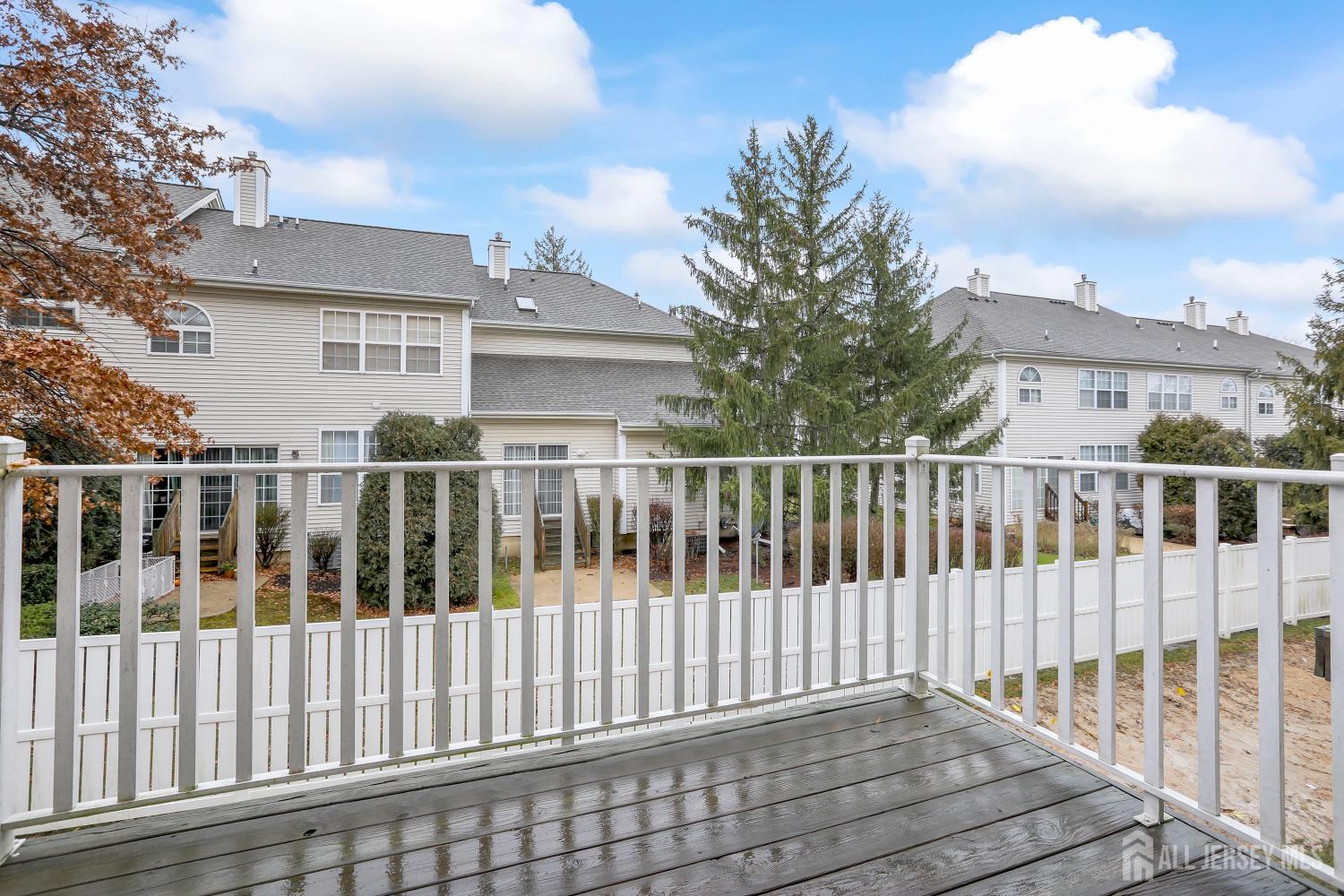 1707 Ridgeview Court Sayreville, NJ 08859 - Photo 2 of 24 a view of a white building on the balcony