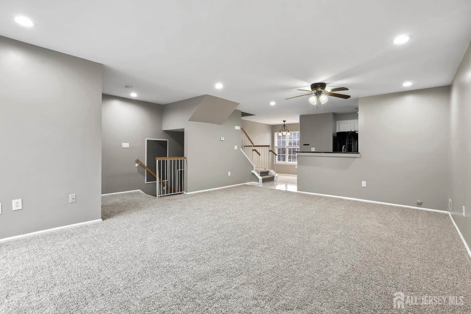 1707 Ridgeview Court Sayreville, NJ 08859 - Photo 3 of 24 an empty room with a kitchen and a sink