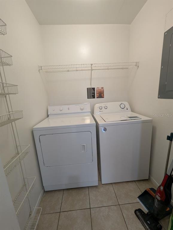 2601 Southwest Archer Road, Unit 203 Gainesville, FL 32608 - Photo 8 of 10 a utility room with dryer and washer