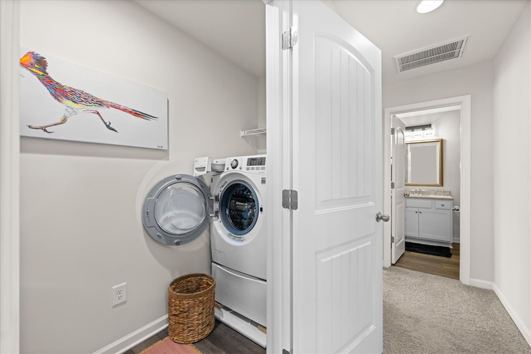 216 Carvel Trail Seneca, SC 29678 - Photo 35 of 46 Functional laundry space with a modern washer and dryer.