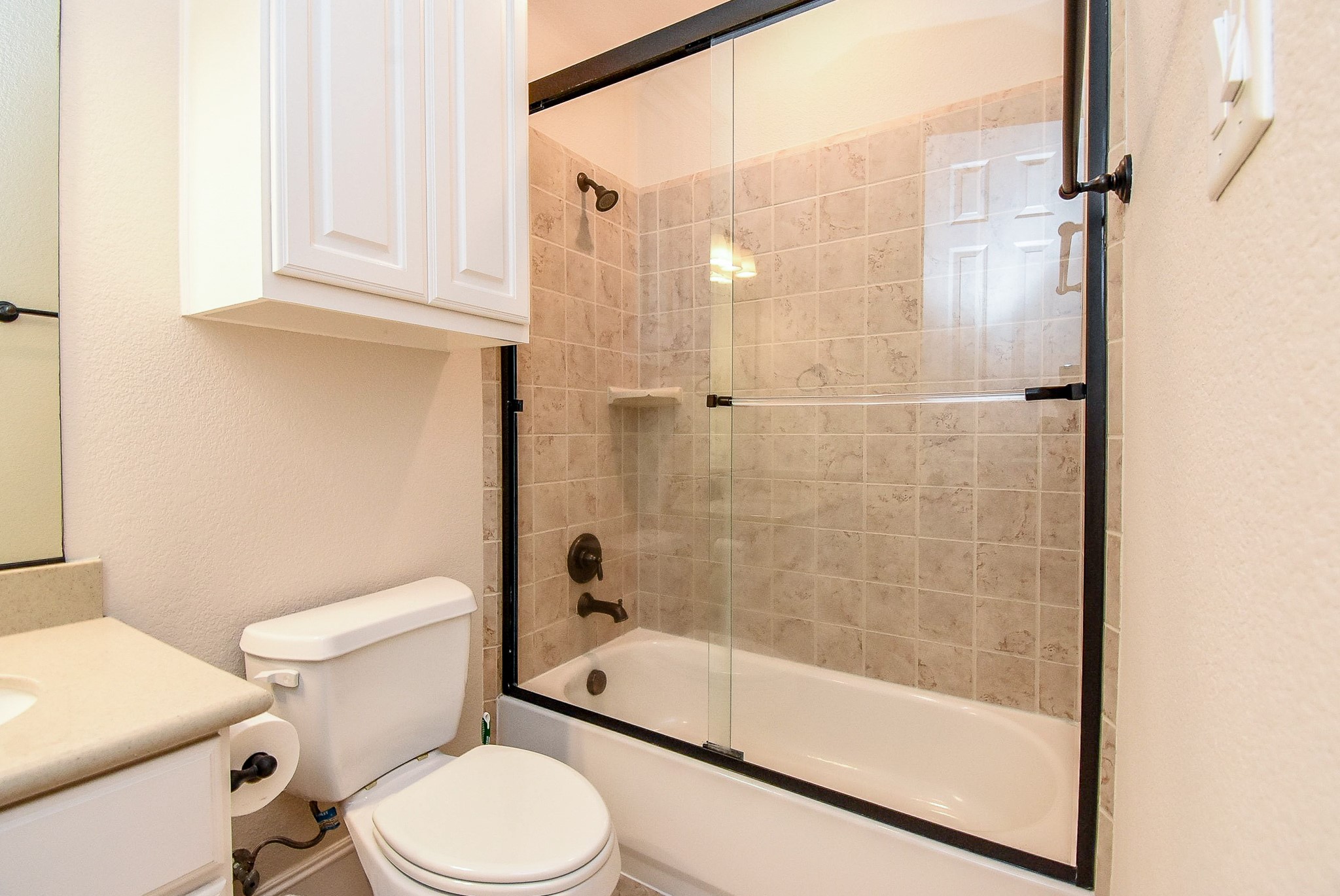 27427 Guthrie Ridge Lane Katy, TX 77494 - Photo 31 of 48 a bathroom with a bathtub and a toilet