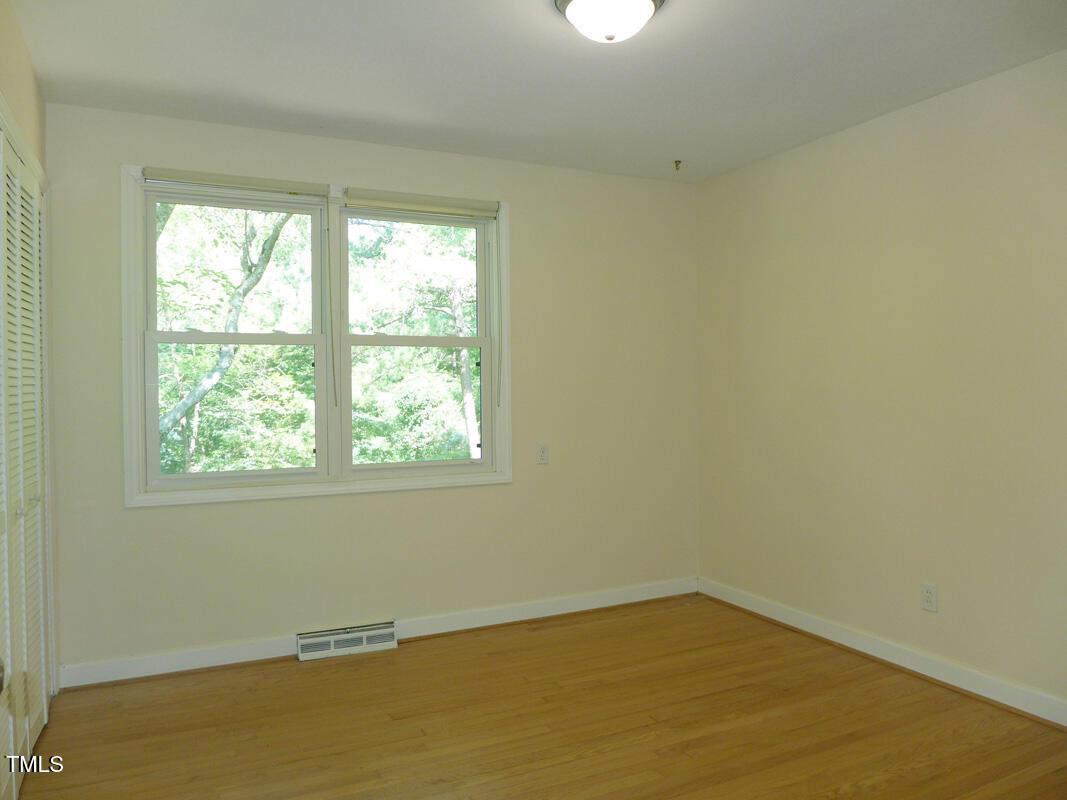 346 Wesley Drive Chapel Hill, NC 27516 - Photo 15 of 24 an empty room with a window