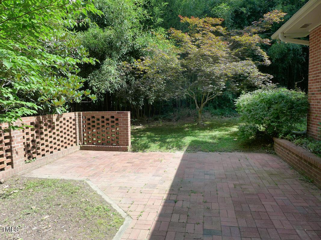 346 Wesley Drive Chapel Hill, NC 27516 - Photo 2 of 24 a view of backyard with wooden fence