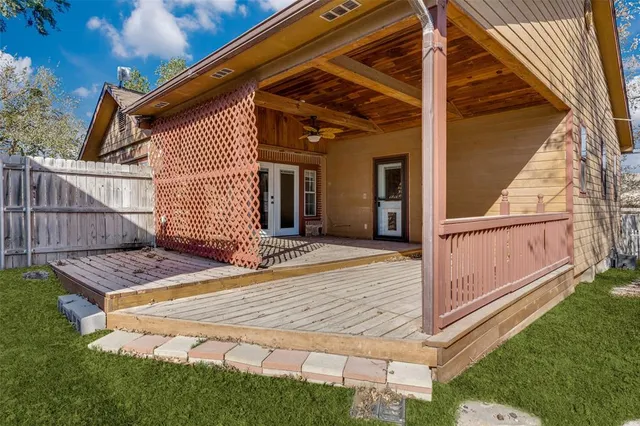 a bathroom with a toilet a sink and a mirror