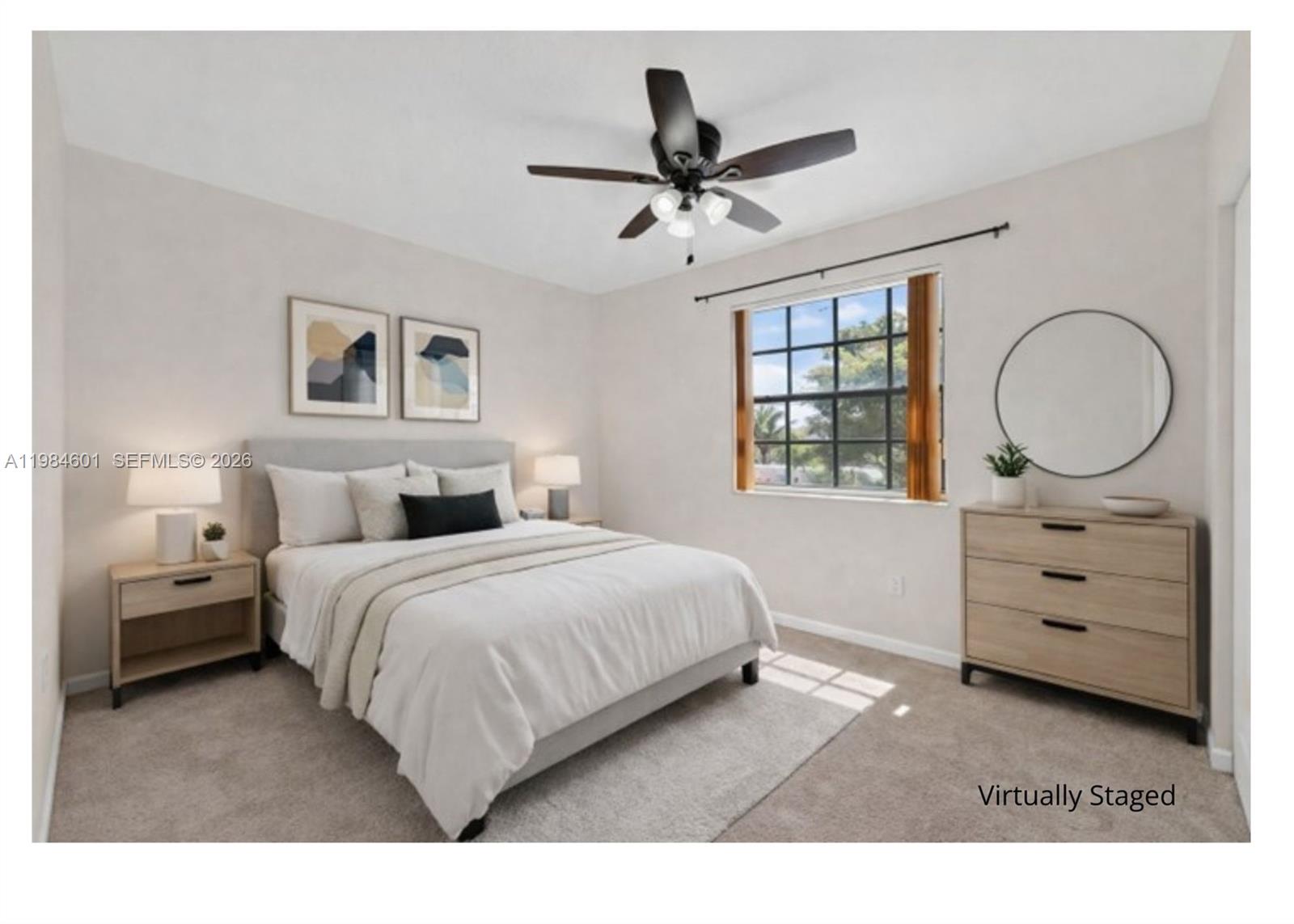 889 Hamilton Drive, Unit 889L Homestead, FL 33034 - Photo 22 of 28 a bedroom with a bed window and a dresser