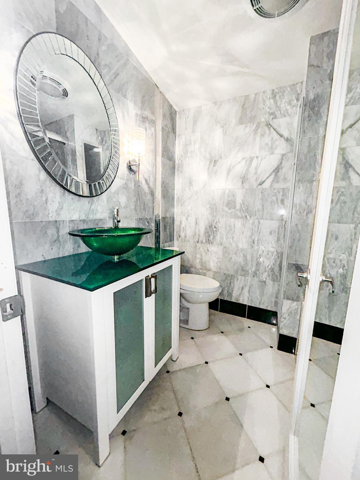 901 Hyde Road Silver Spring, MD 20902 - Photo 13 of 37 Main level bathroom