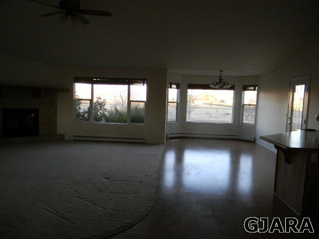 976 20 Road Fruita, CO 81521 - Photo 11 of 16 an empty room with windows