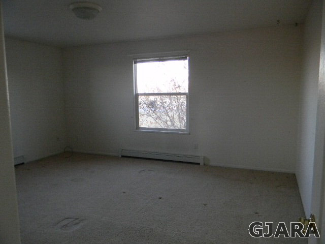 976 20 Road Fruita, CO 81521 - Photo 15 of 16 an empty room with a window