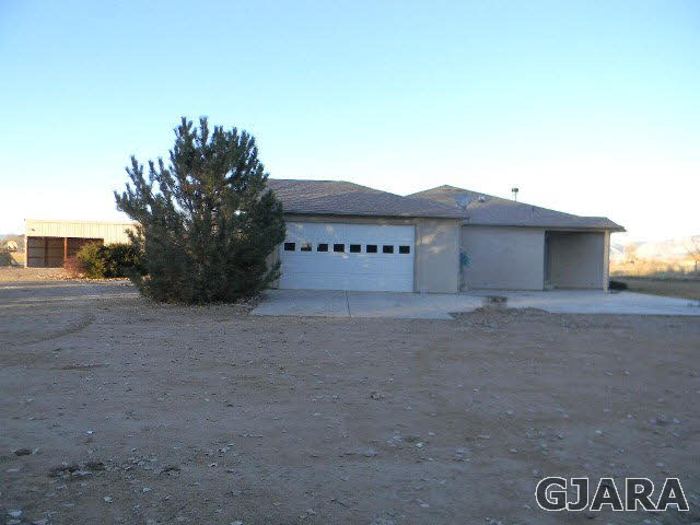 976 20 Road Fruita, CO 81521 - Photo 4 of 16 a view of a house with a street