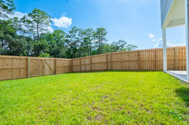a view of outdoor space and yard