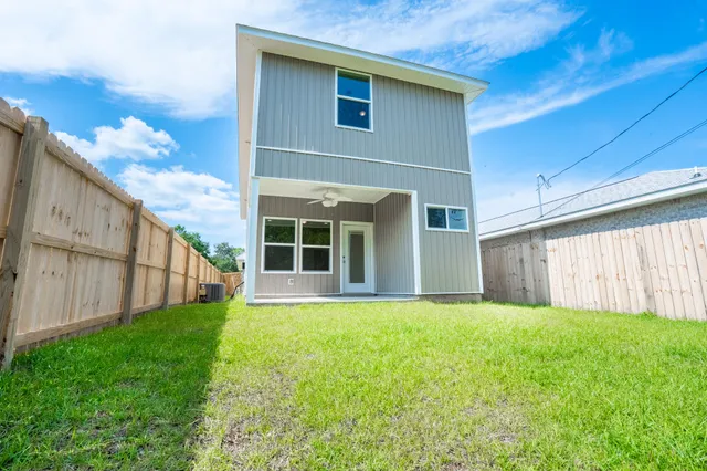 a view of a backyard with garden