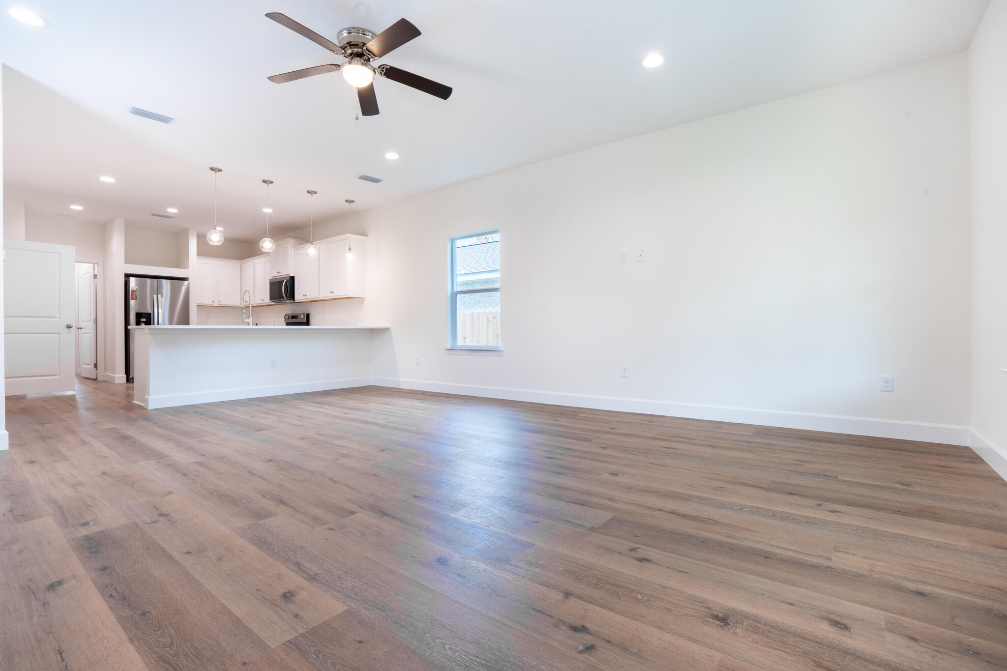110 2nd Avenue Shalimar, FL 32579 - Photo 4 of 15 a view of a kitchen with a dishwasher and a stove top oven