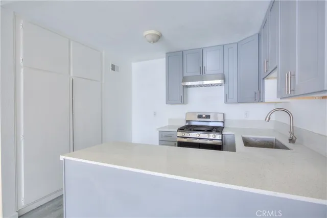 a bathroom with a bathtub and a sink