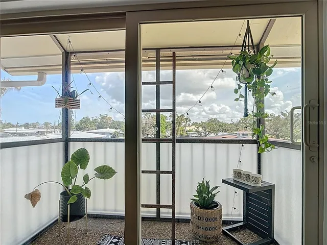 an aerial view of residential building with parking space