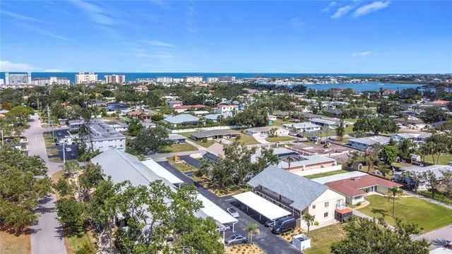 an aerial view of a city with lots of residential buildings