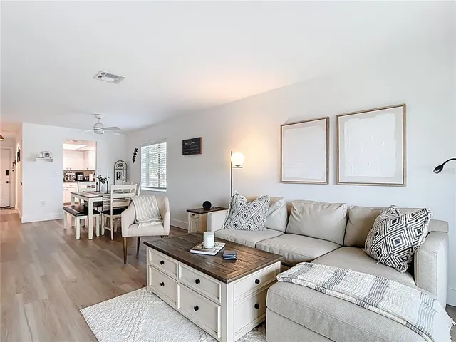 a view of kitchen and wooden floor