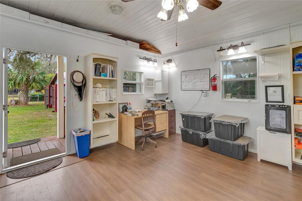 Wolf Branch Road Sorrento, FL 32776 - Photo 12 of 33 a living room with furniture and a large window