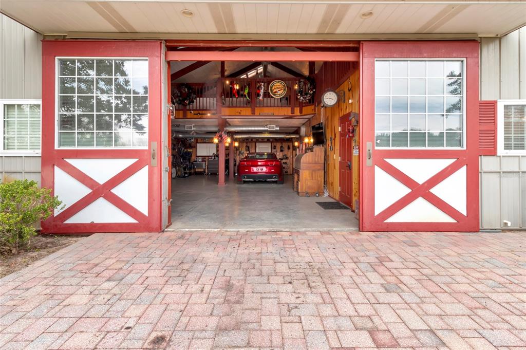 Wolf Branch Road Sorrento, FL 32776 - Photo 15 of 33 a view of room with wooden floor and a fireplace