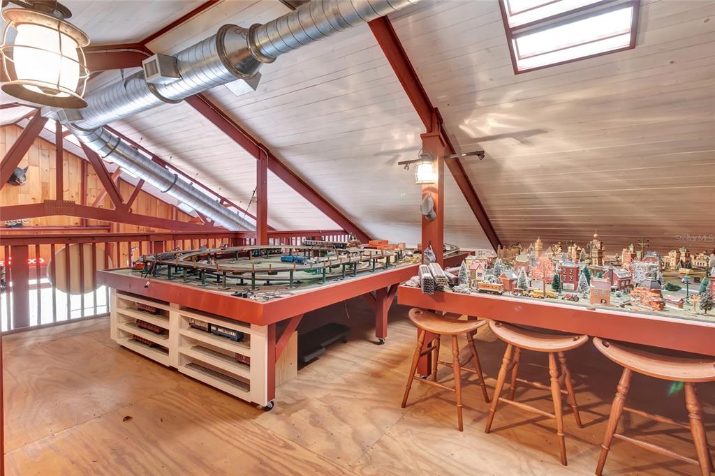 Wolf Branch Road Sorrento, FL 32776 - Photo 20 of 33 a view of a chairs and table on the roof deck