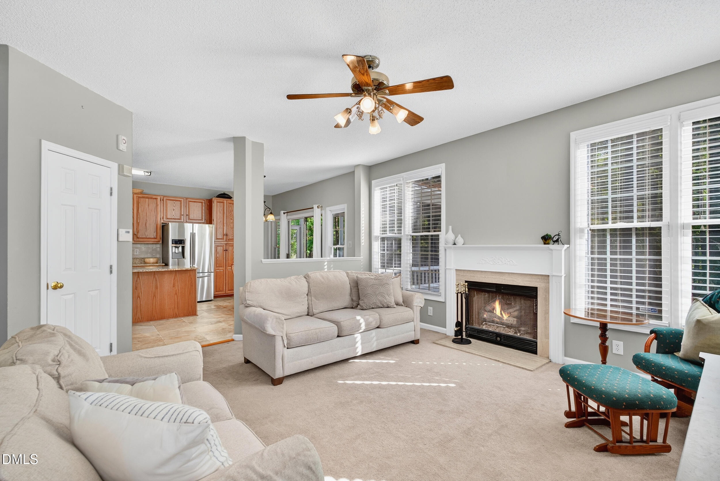105 Point Harbor Drive Cary, NC 27519 - Photo 13 of 39 a living room with furniture and a fireplace
