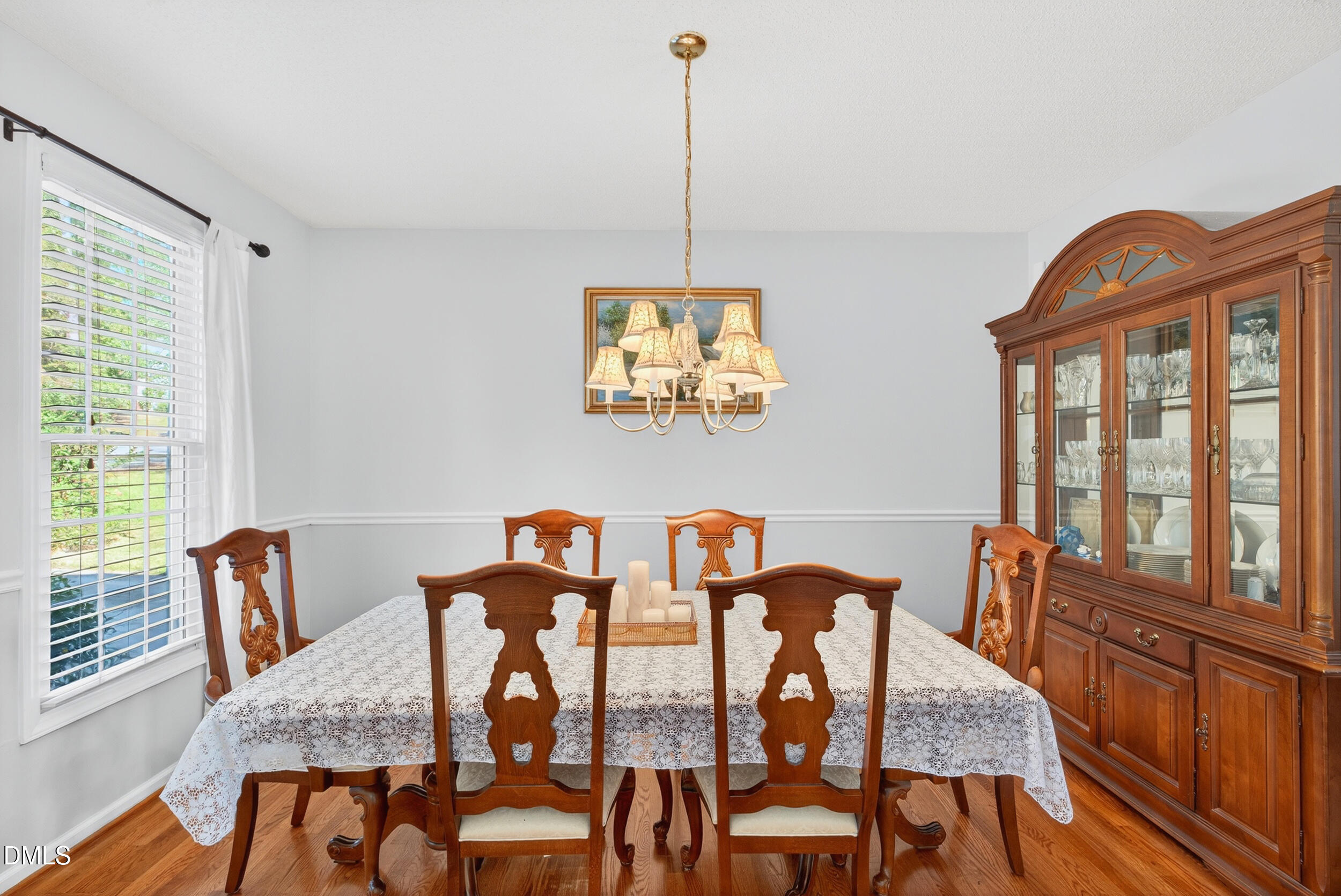 105 Point Harbor Drive Cary, NC 27519 - Photo 15 of 39 a view of a dining room with furniture window and wooden floor