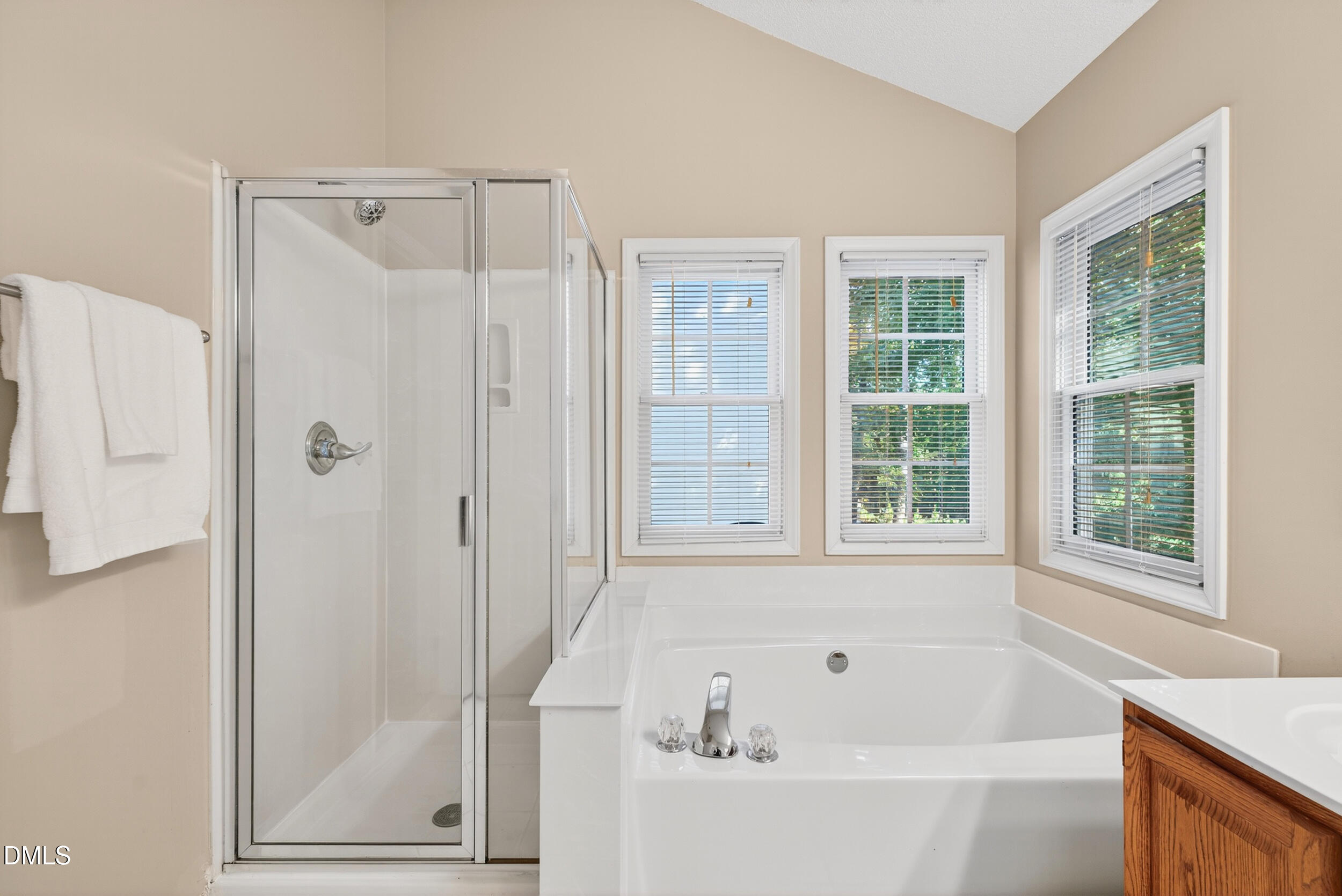 105 Point Harbor Drive Cary, NC 27519 - Photo 25 of 39 a bathroom with a bathtub and a shower