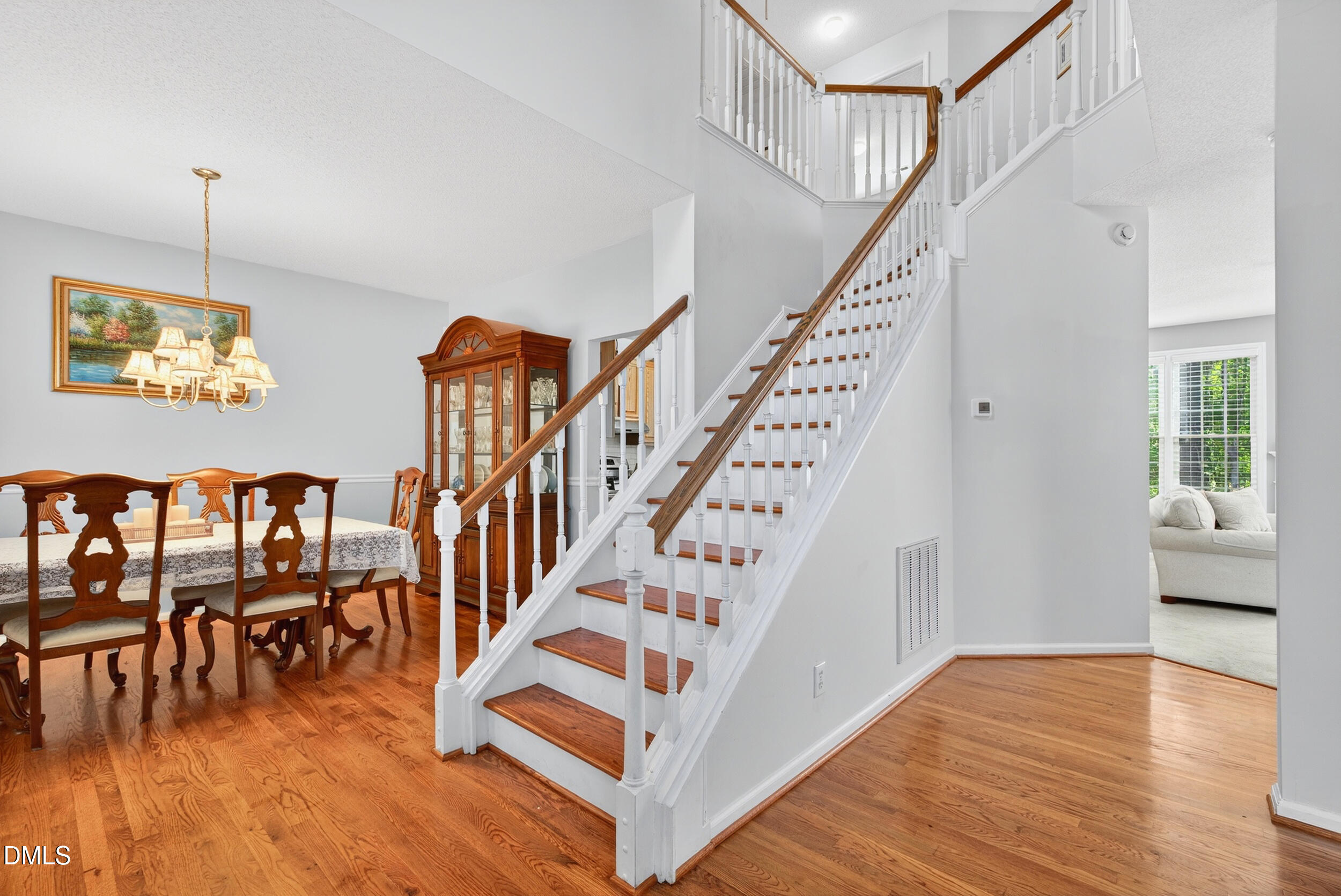 105 Point Harbor Drive Cary, NC 27519 - Photo 3 of 39 a view of entryway and hall with wooden floor