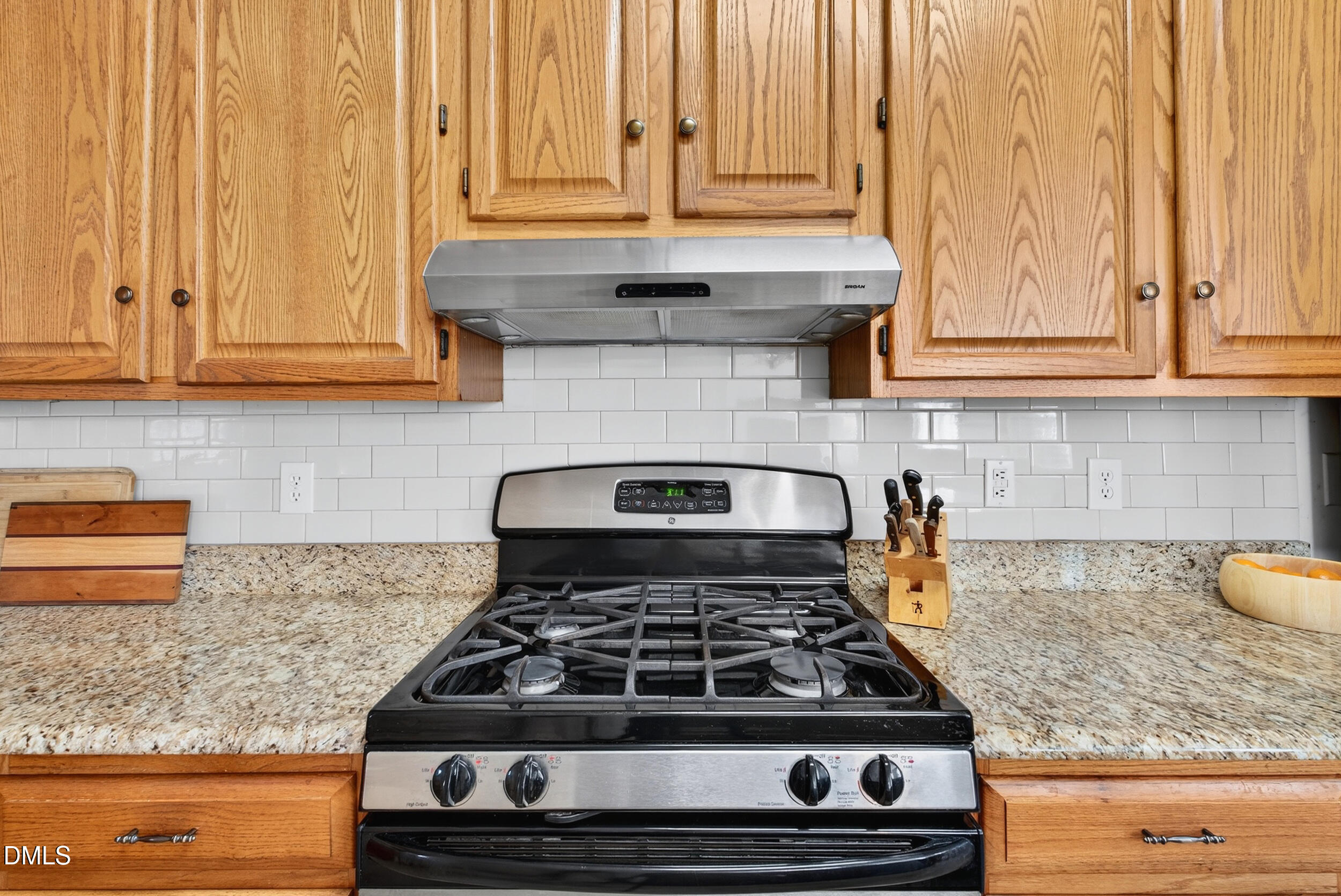 105 Point Harbor Drive Cary, NC 27519 - Photo 9 of 39 a stove top oven sitting inside of a kitchen