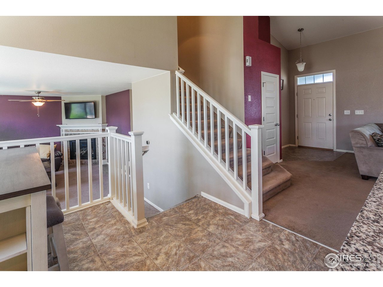 8594 Raspberry Drive Frederick, CO 80504 - Photo 13 of 40 a view interior of a house with stairs