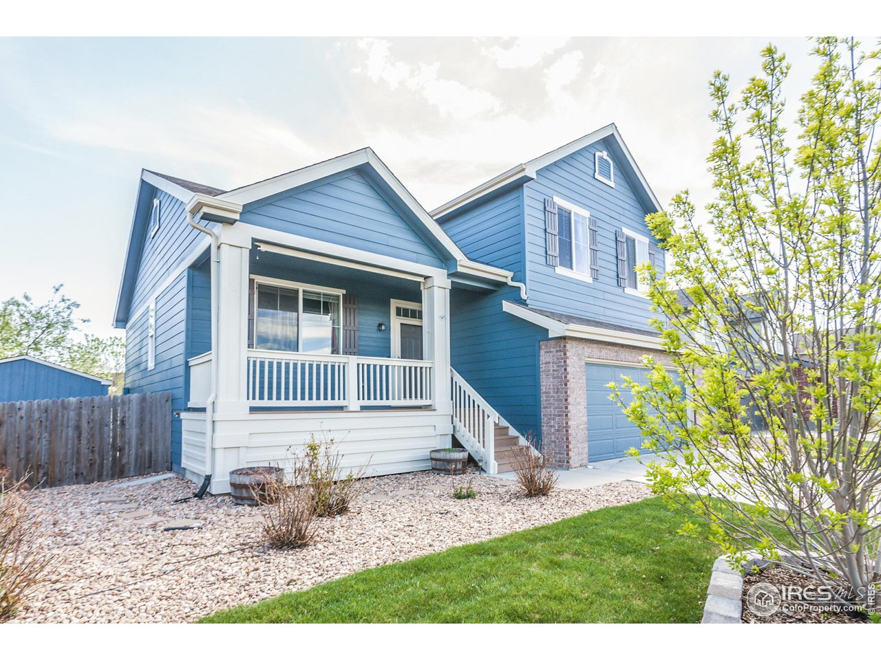 8594 Raspberry Drive Frederick, CO 80504 - Photo 3 of 40 a backyard of a house with yard barbeque oven and outdoor seating