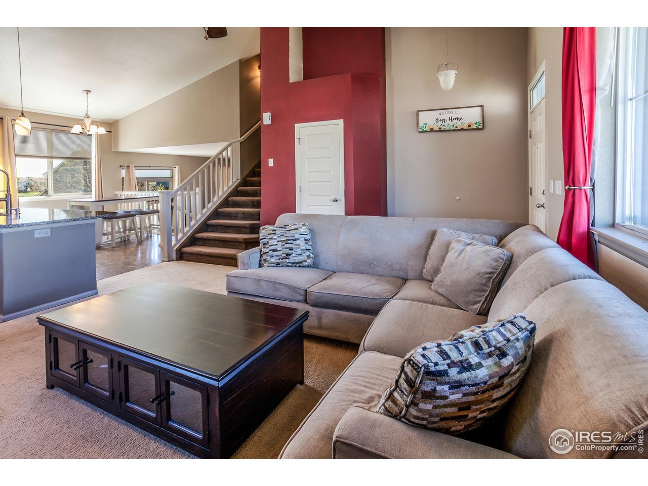 8594 Raspberry Drive Frederick, CO 80504 - Photo 7 of 40 a living room with furniture and a wooden floor