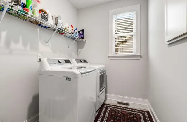 a balcony with furniture and a flat screen tv