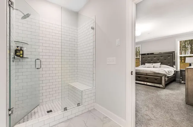 an aerial view of a house with swimming pool and outdoor space