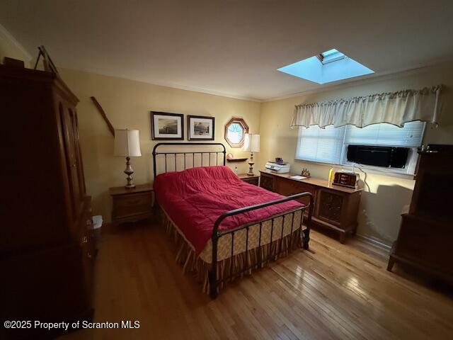 405 17th Avenue Scranton, PA 18504 - Photo 20 of 28 a living room with a bed furniture and a window