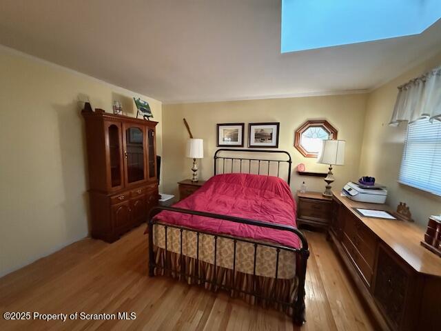 405 17th Avenue Scranton, PA 18504 - Photo 21 of 28 a bedroom with a bed window and dresser