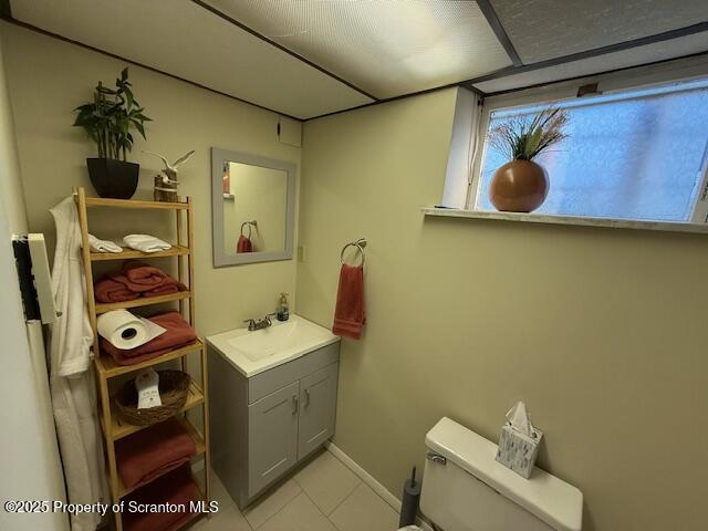 405 17th Avenue Scranton, PA 18504 - Photo 23 of 28 a bathroom with a sink toilet and mirror