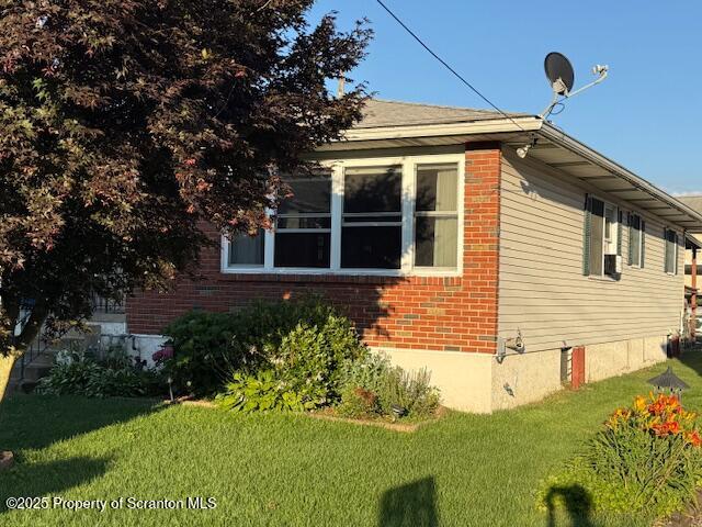 405 17th Avenue Scranton, PA 18504 - Photo 3 of 28 a front view of a house with a yard