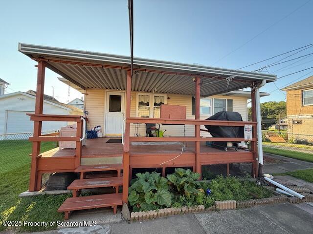 405 17th Avenue Scranton, PA 18504 - Photo 6 of 28 a backyard of a house with barbeque oven table and chairs