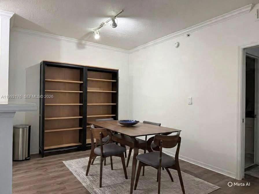 6831 Southwest 44th Street, Unit 203 Miami, FL 33155 - Photo 7 of 15 a view of a workspace with furniture