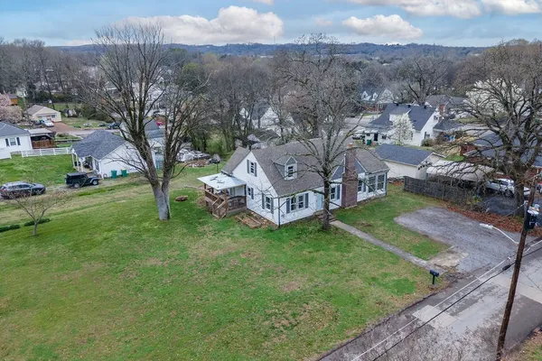 a view of a house with a big yard
