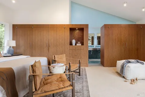 a bed room with a bed and furniture
