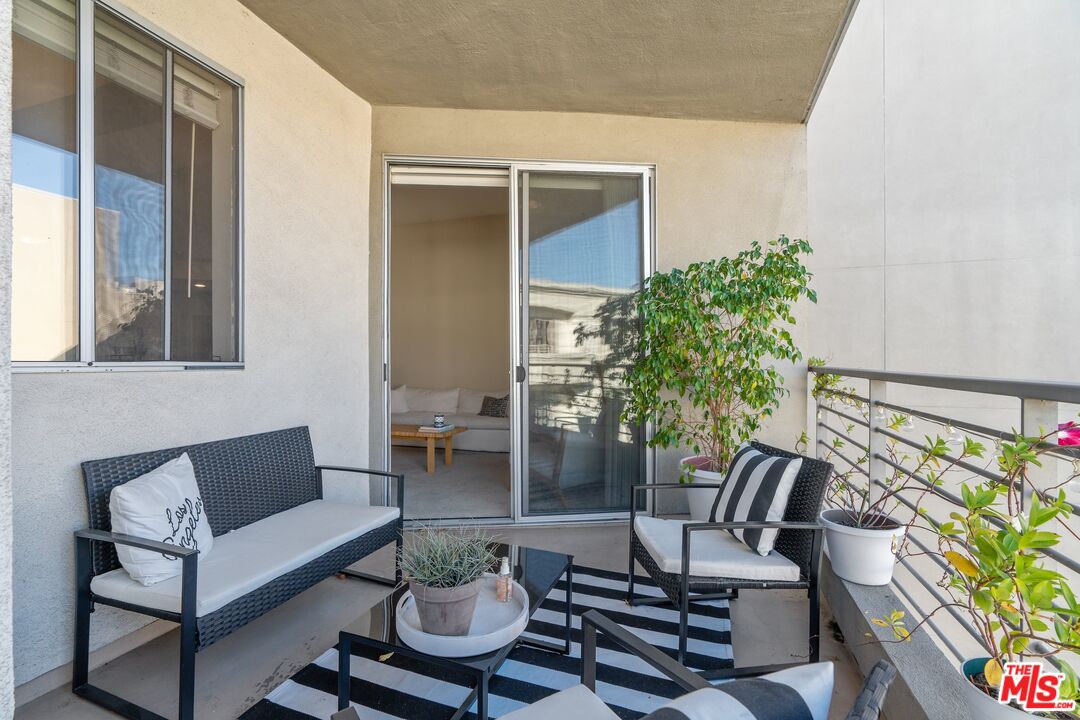 4170 Fair Avenue, Unit PH2 Studio City, CA 91602 - Photo 18 of 42 a outdoor living space with furniture and a potted plant