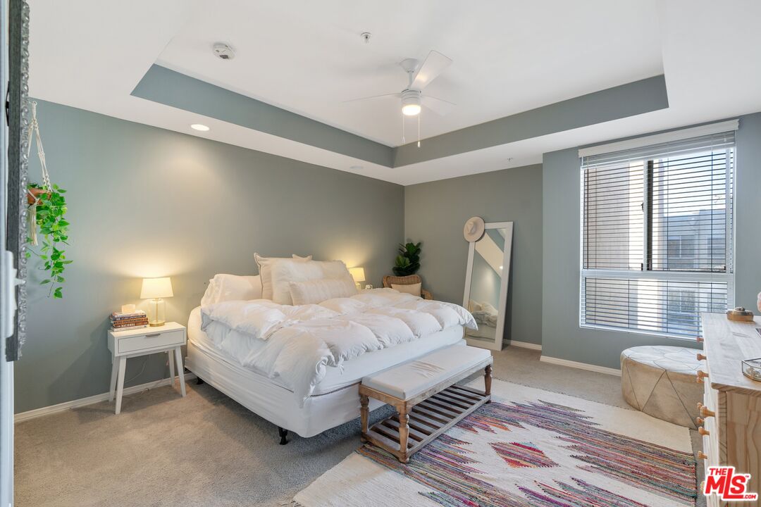 4170 Fair Avenue, Unit PH2 Studio City, CA 91602 - Photo 33 of 42 a bedroom with a bed table chair and window