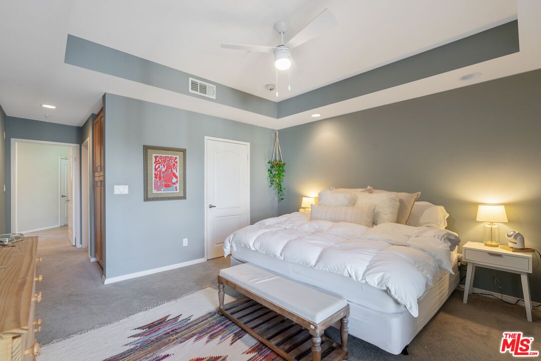 4170 Fair Avenue, Unit PH2 Studio City, CA 91602 - Photo 35 of 42 a bedroom with a bed and a table