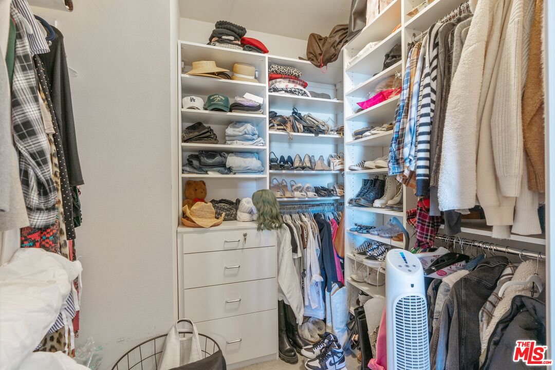 4170 Fair Avenue, Unit PH2 Studio City, CA 91602 - Photo 36 of 42 a view of walk in closet with clothes