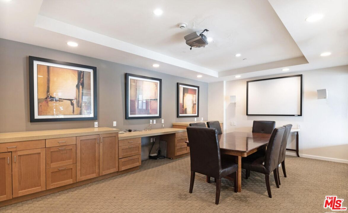 4170 Fair Avenue, Unit PH2 Studio City, CA 91602 - Photo 42 of 42 a view of a dining room with furniture and chandelier