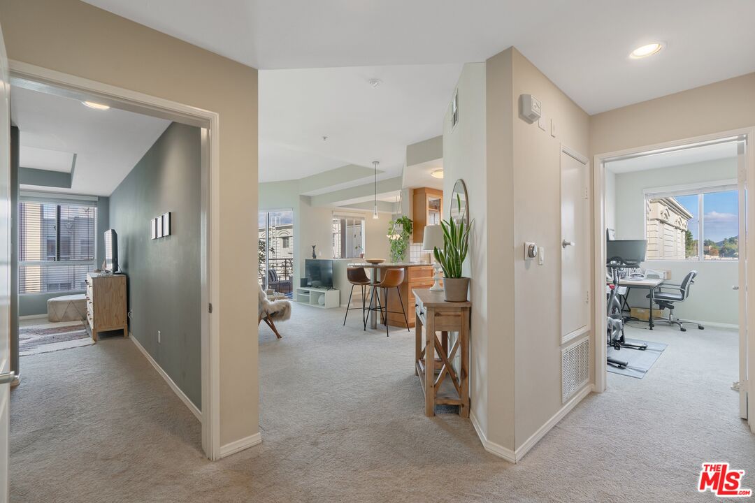 4170 Fair Avenue, Unit PH2 Studio City, CA 91602 - Photo 5 of 42 a view of a hallway with living room and furniture